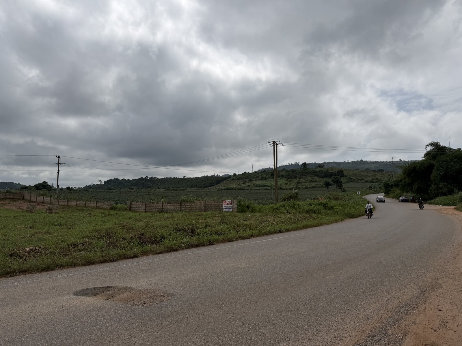 Road view showing distant hills